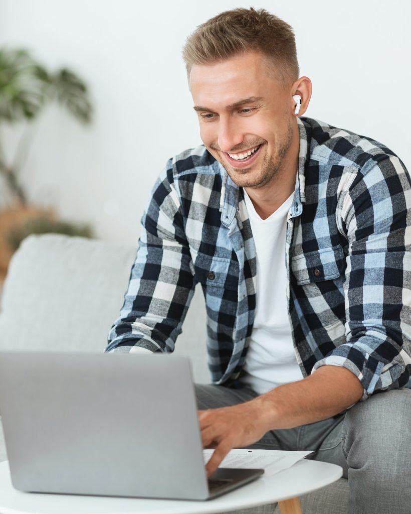 guy-listening-to-music-online-in-headphones.jpg